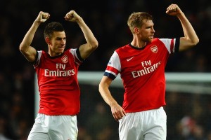 getty_mertesackerkoscielny20130103